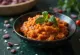 Romesco padažas patiektas su keptais patiekalais