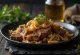 Bistec Encebollado patiektas su svogūnais ir garnyru